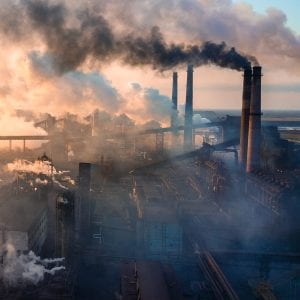 factories belching smoke