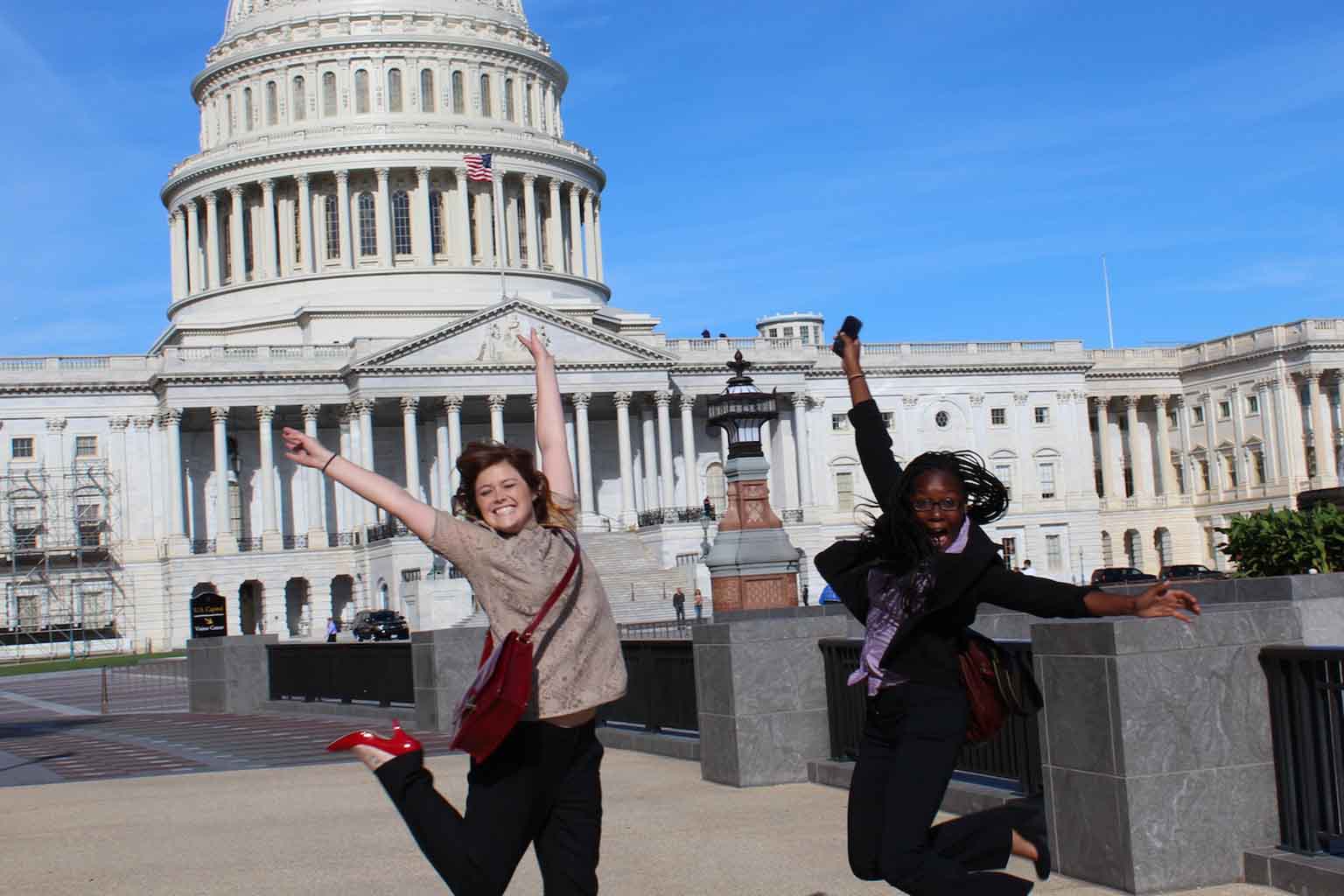 Students jump in front of Capitol